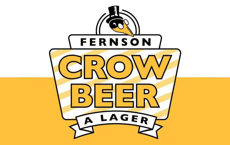 Fernson Taps a Crow Beer at the Crow Bar